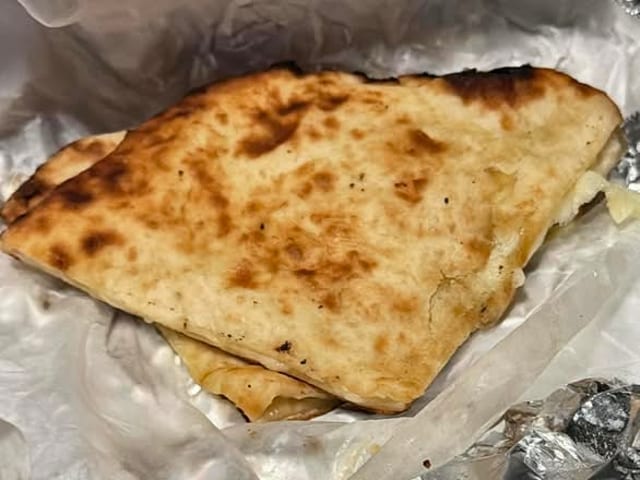 51. Cheese Naan.