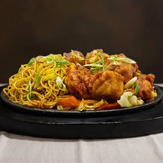 124. Sizzler (Chicken) Momo